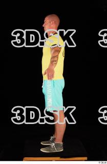 0011 Whole body yellow shirt turquoise shorts brown shoes of…